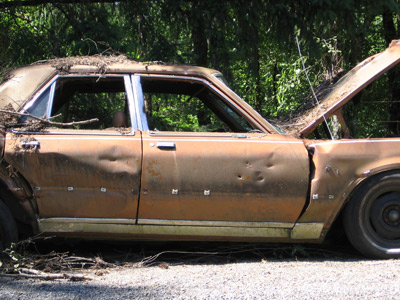 Unwanted Sedan Waiting to Be Sold to Salvage Yard