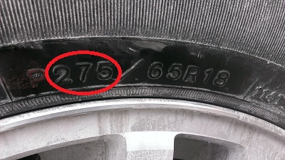 Tire Markings on Used Tire Highlighting Section Width
